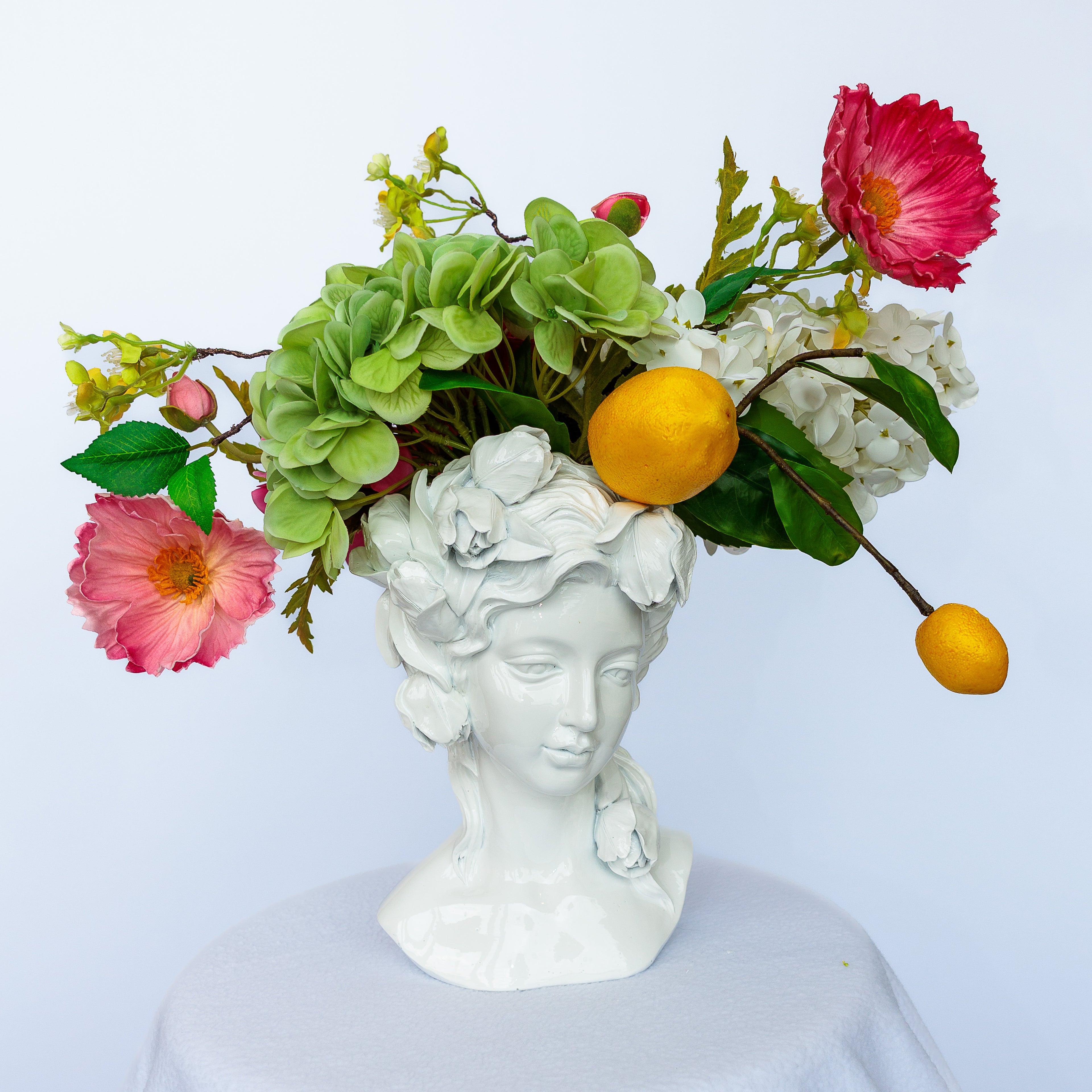 White Lacquered Resin Female Bust Vase with Flower Arrangement