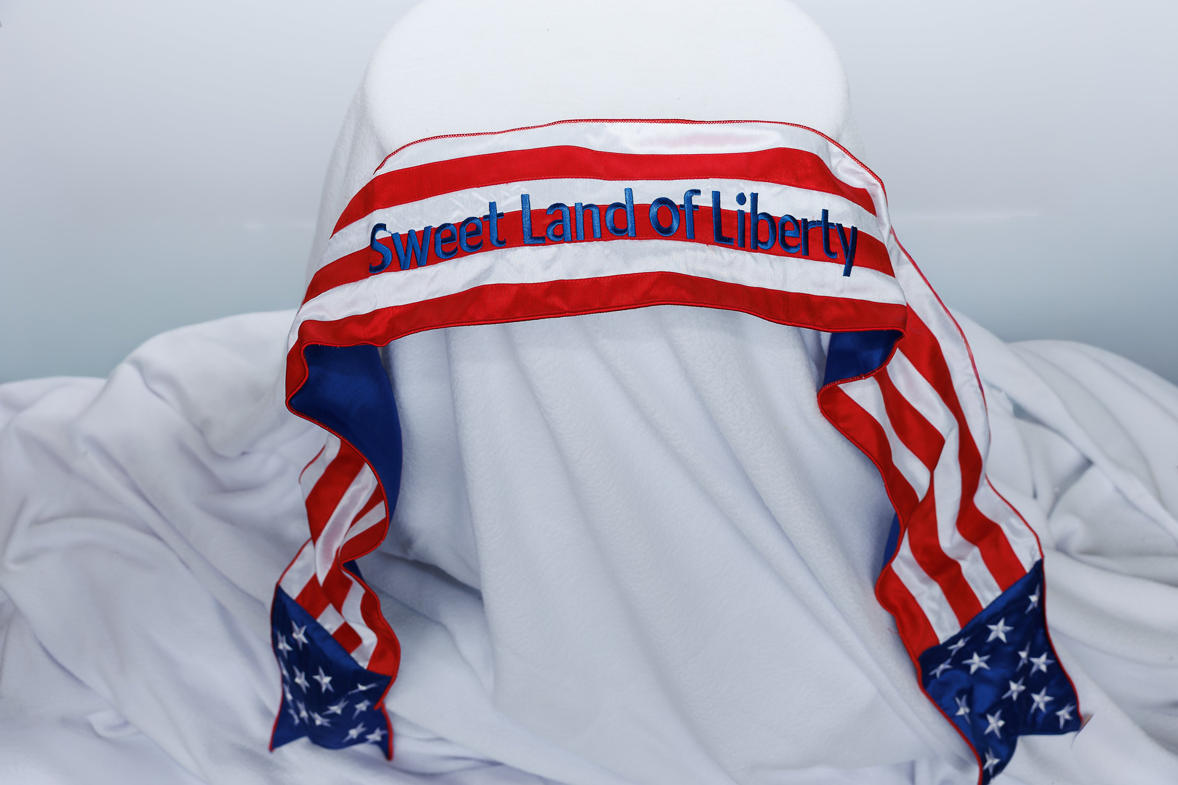 Dupioni silk, embroidered stars and bright white flag, sweet land of Liberty