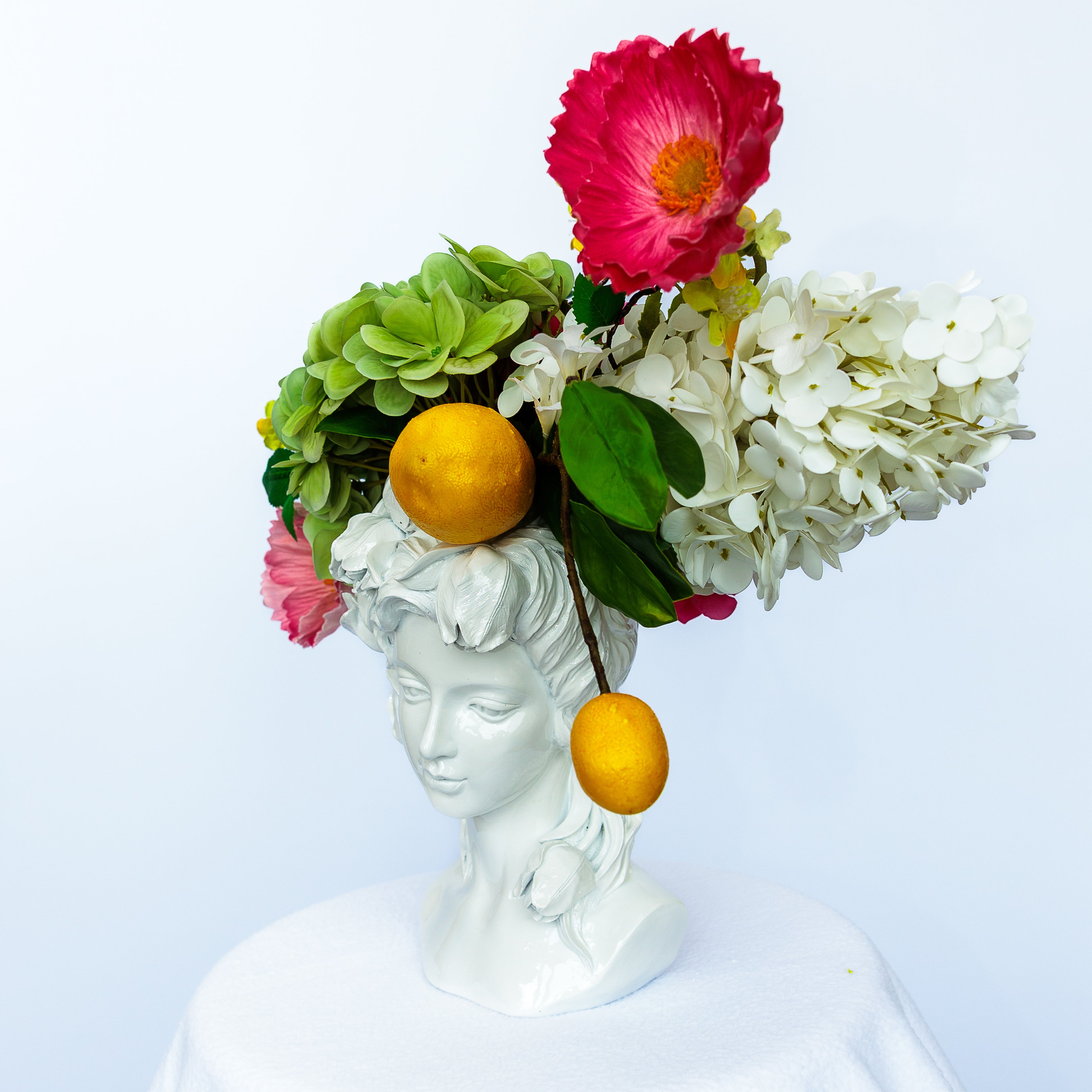 White Lacquered Resin Female Bust Vase with Flower Arrangement