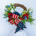 Patriotic Red, White, and Blue wreath, with American flag bow