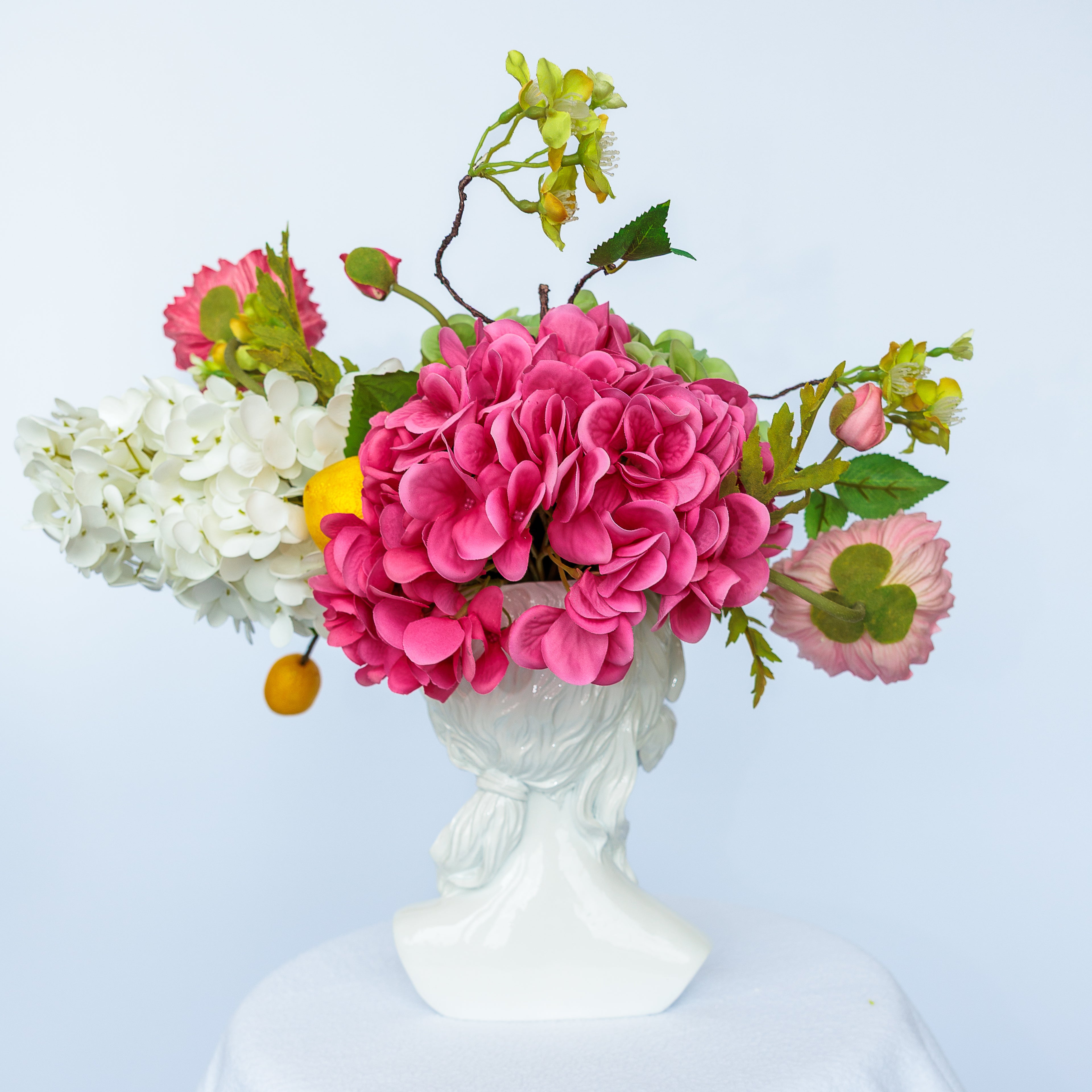 White Lacquered Resin Female Bust Vase with Flower Arrangement