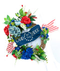 Red, White, and Blue wreath with Land of the Free banner