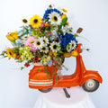 Orange resin scooter planter