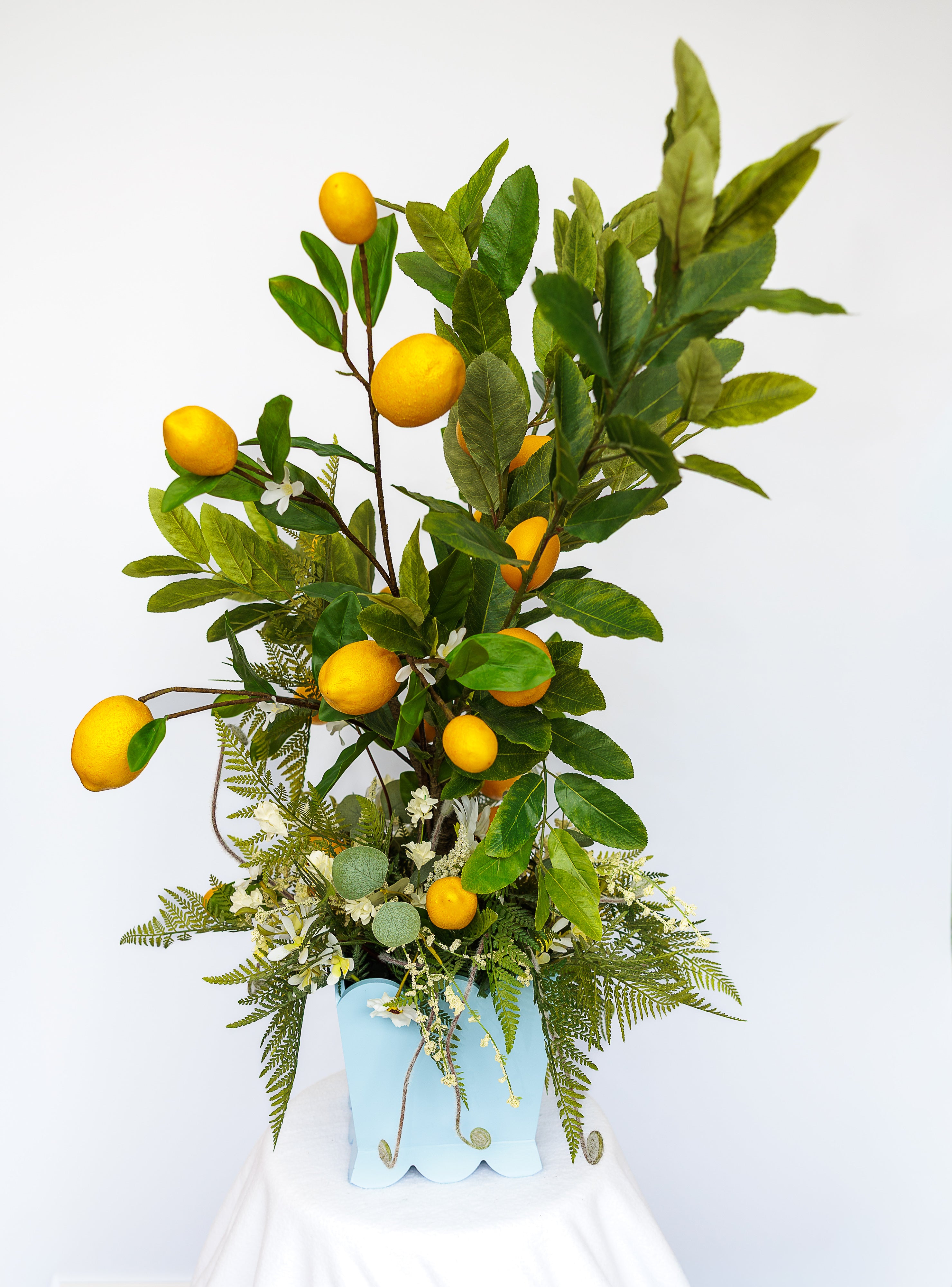 Wedgewood blue wooden planter with lemon tree and florals