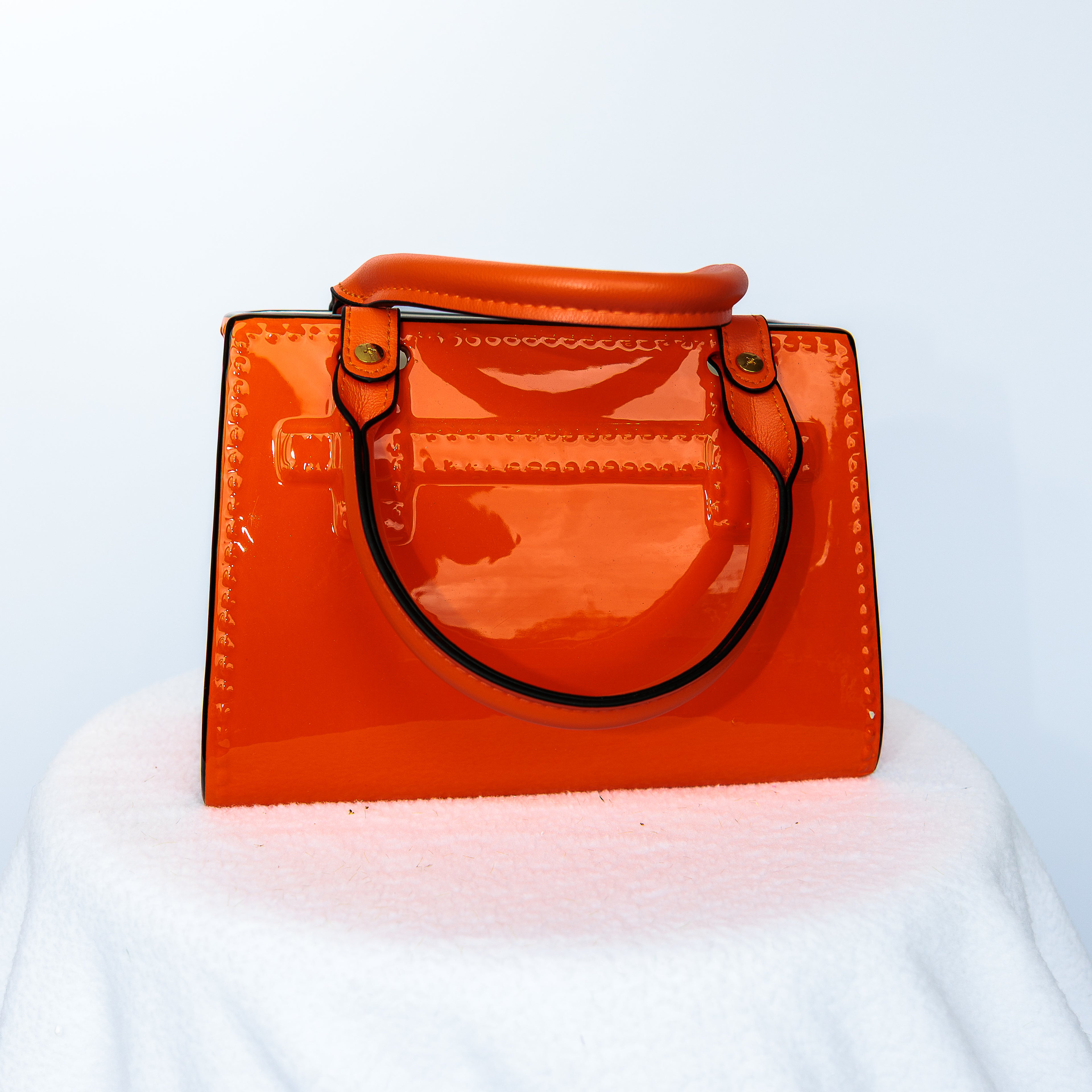 Orange Ceramic purse with leather handles