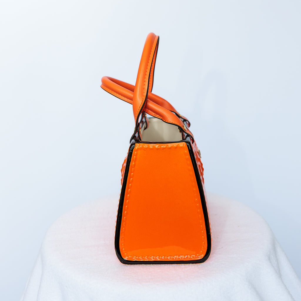 Orange Ceramic purse with leather handles