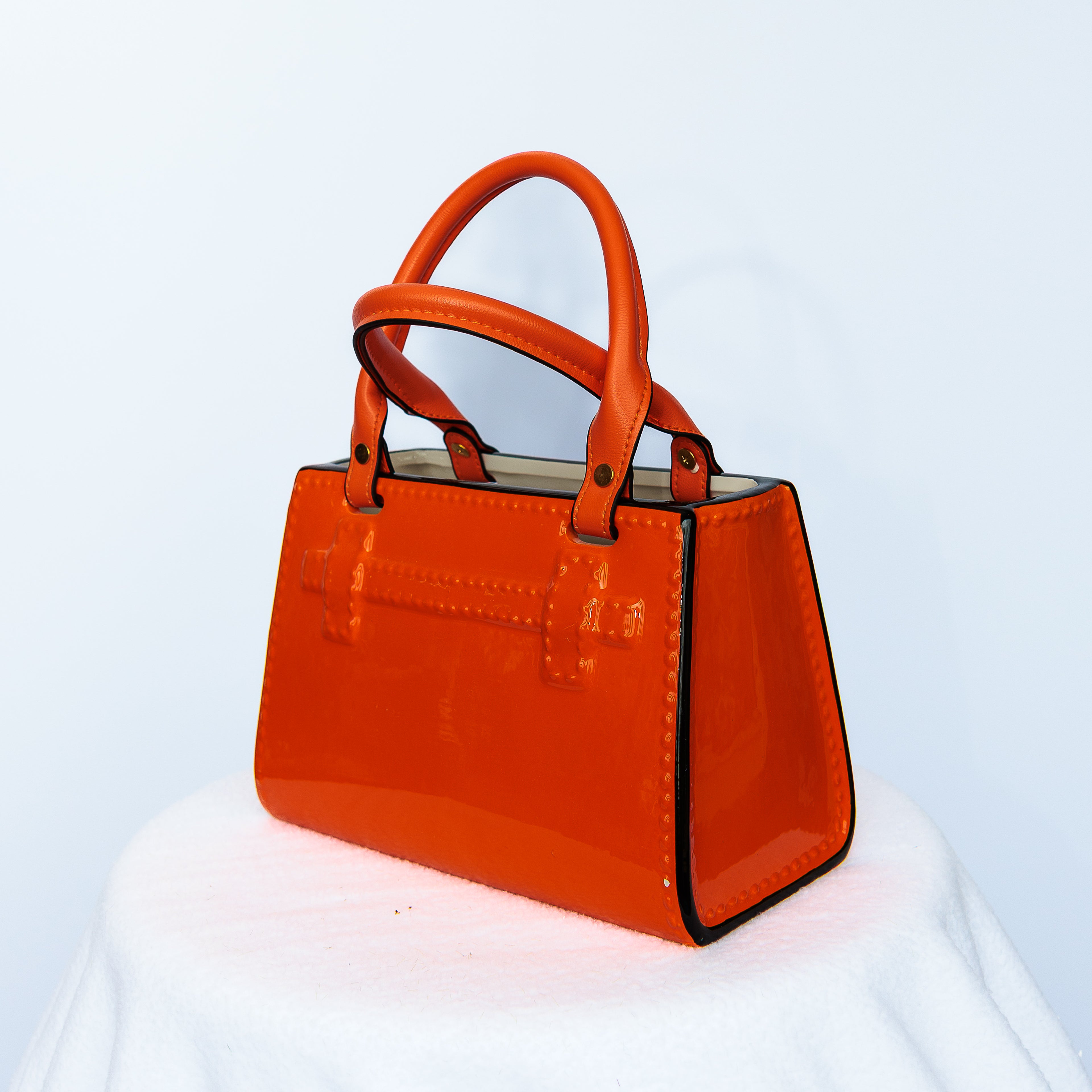 Orange Ceramic purse with leather handles